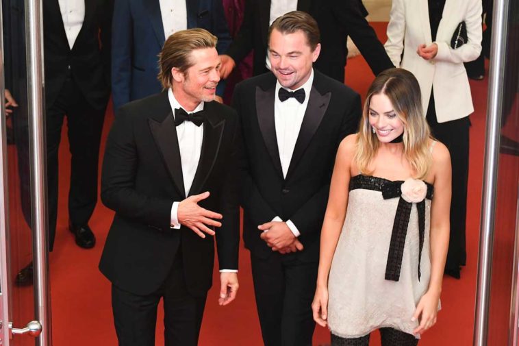 Brad Pitt, Leonardo DiCaprio, et Margot Robbie à Cannes. © ANTONIN THUILLIER / AFP